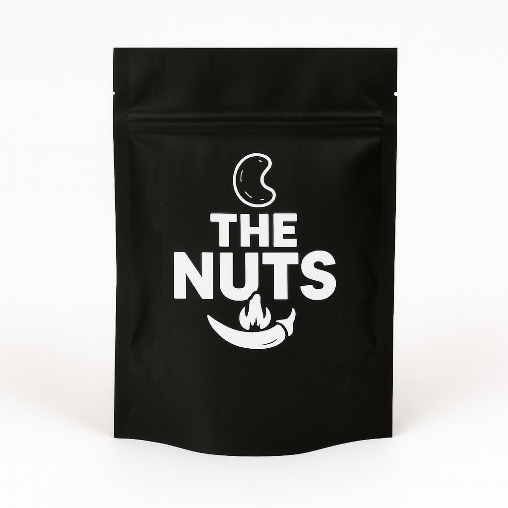 Black packaging of 'The Nuts' with white text and logo on a white background